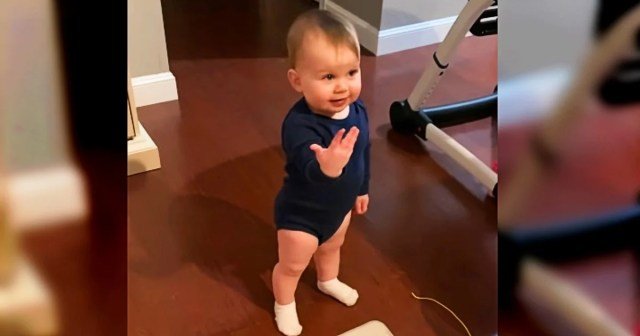 Adorable baby girl wins hearts carrying on endearingly “heated” talk with dad