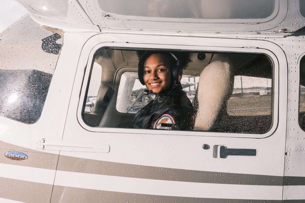 Kamora Freeland, 17, New York City's youngest African American female pilot, in an airplane at Republic Airport in Farmingdale, New York. 