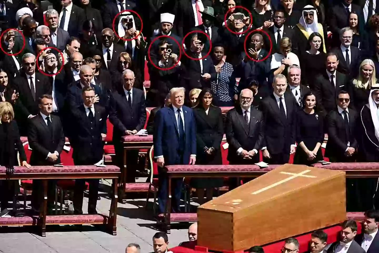 Several people were seen taking photos of Pope Francis' coffin ( Isabella BONOTTO / AFP) (Photo by ISABELLA BONOTTO/AFP via Getty Images)