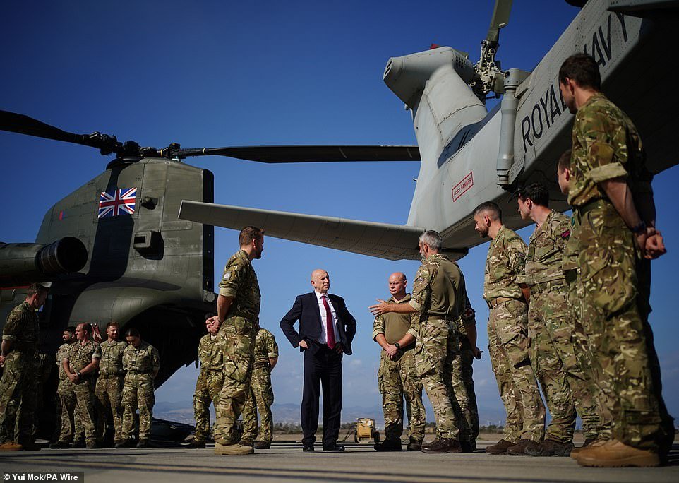 Defence Secretary John Healey (pictured center) said: 'The safety of UK personnel and bases is my top priority. Force protection is at its highest level and we deployed additional jets [to Cyprus] this week.' Other experts warned of a 'new era of terrorism' and US Vice President J D Vance said the FBI and law enforcement were on alert for threats on American soil. Sir Keir Starmer and President Trump discussed the need for Iran to return to the negotiating table in a phone call last night, No 10 said.