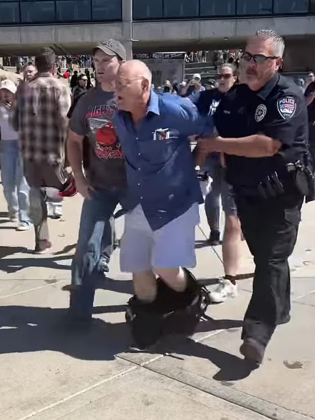 'How dare you, you f***ing monster!' one witness yelled as the man, who has not been identified, was walked away with his trousers down